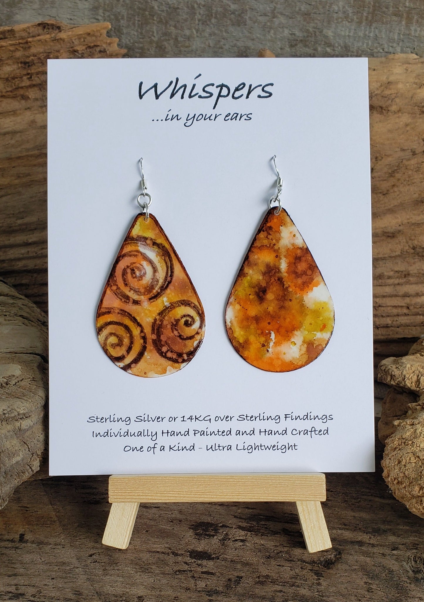 Earth tone Swirls Ultra lightweight Hand painted paper earrings. Watercolor, teardrop shape. Back is painted with complimentary colors. Sterling silver findings 2 1/2" in Length