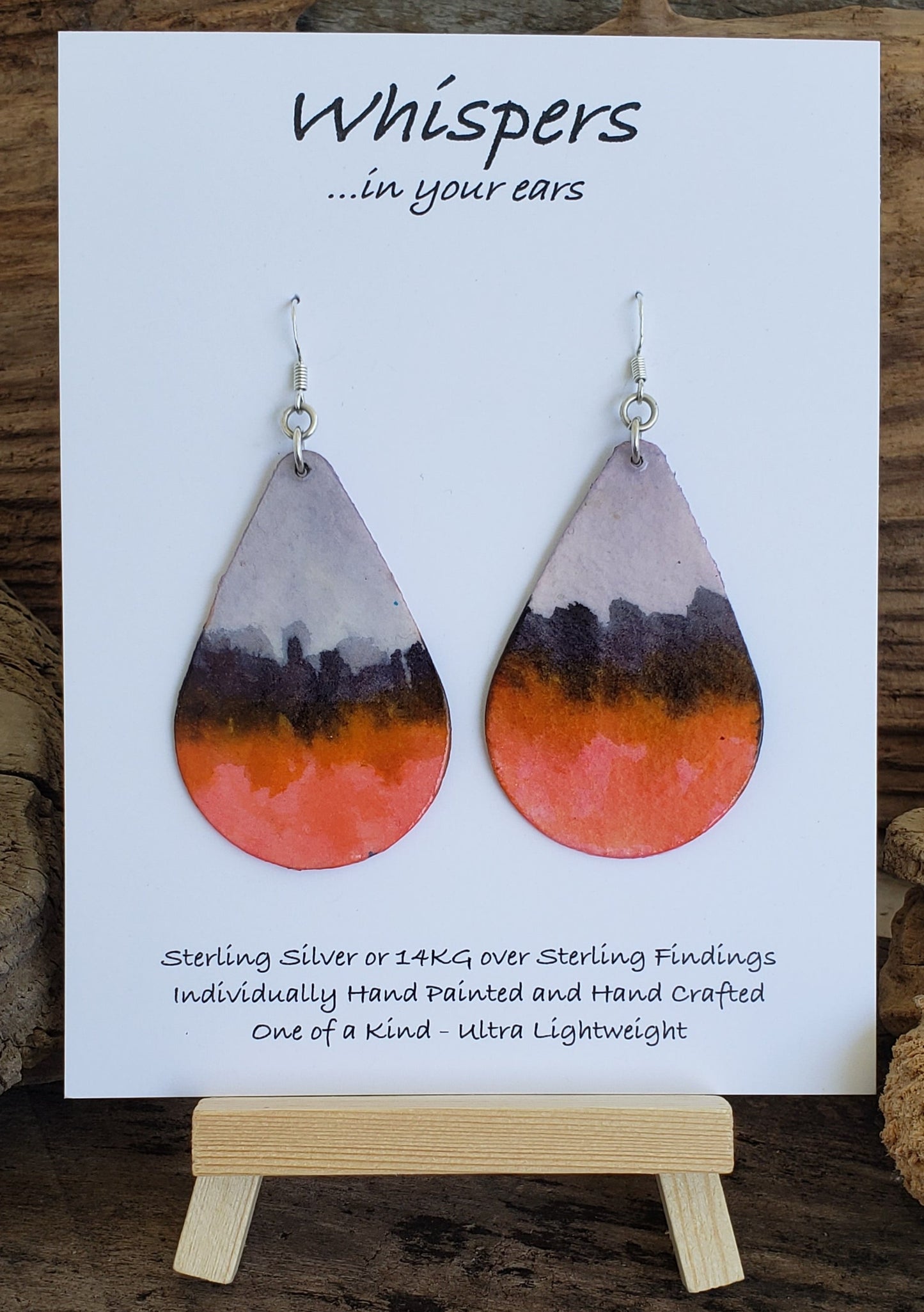 Hand painted watercolor, Blues and Pinks. Abstract Nature scape Ultra lightweight paper earrings. Back is painted with similar design complimentary colors. Tear drop shape 2 1/2" in Length