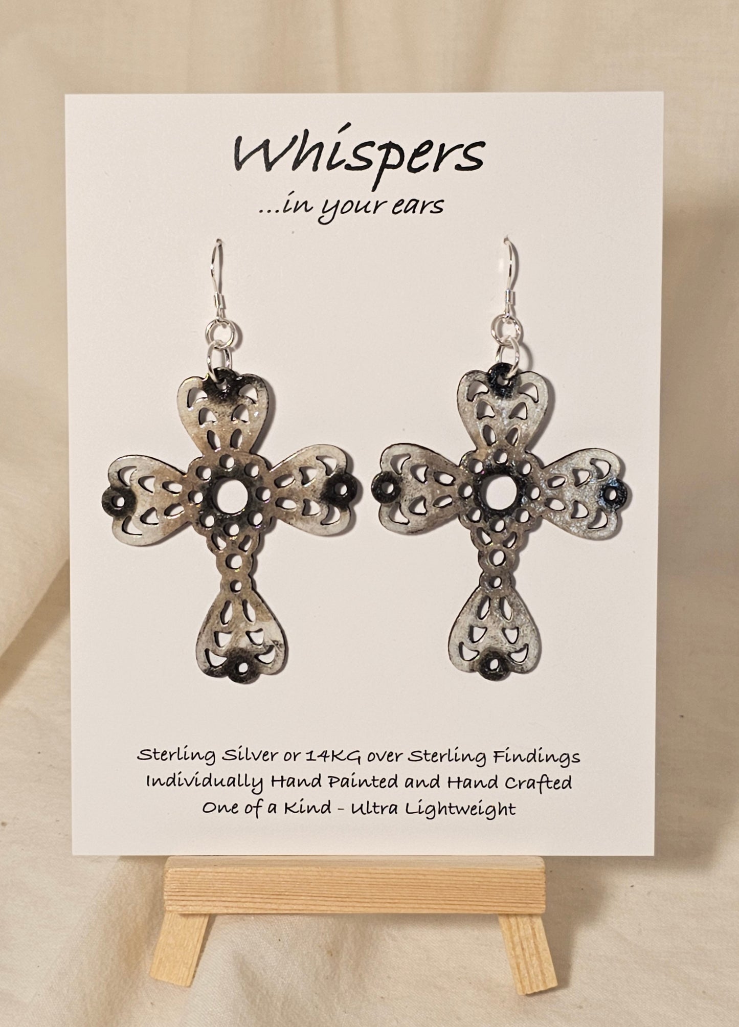 Weathered Wood Cross Hand Painted Wood Earrings. White, Beige and Brown2 1/4" Cross. Back is painted to match. Enameled for durability. Sterling Silver findings. Hangs 2 1/2" in length