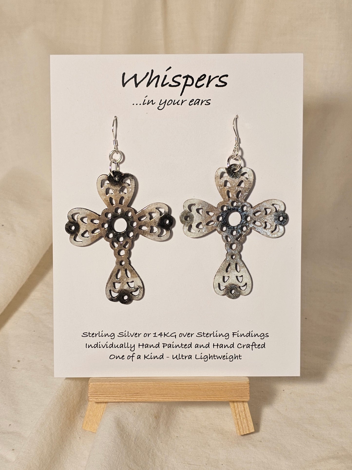Weathered Wood Cross Hand Painted Wood Earrings. White, Beige and Brown2 1/4" Cross. Back is painted to match. Enameled for durability. Sterling Silver findings. Hangs 2 1/2" in length