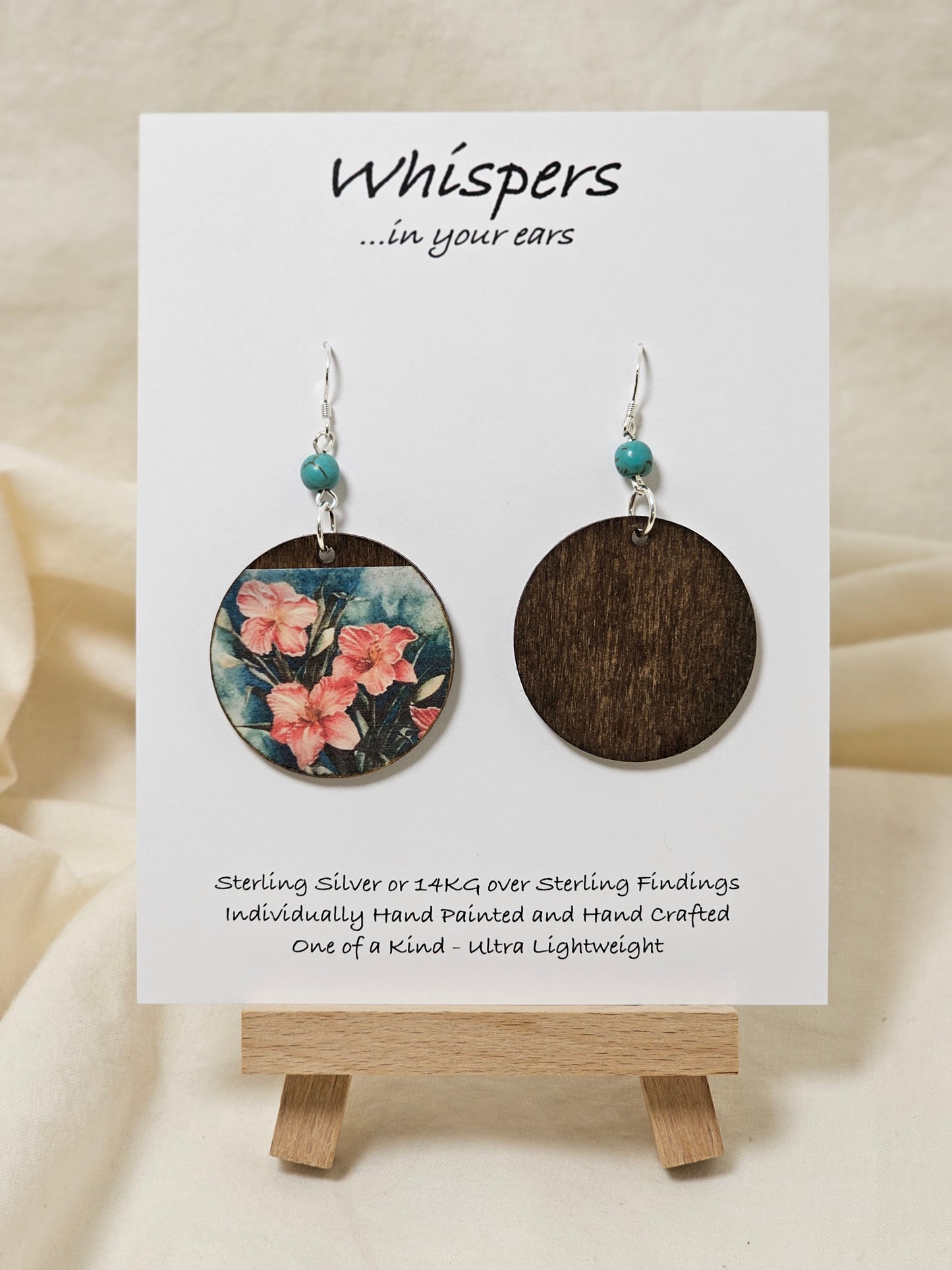 Tiger Lilies Art Print Wood Earrings. Artwork by Lee M. Hein. 1 1/2" Circle. Back is painted with dark brown wash. Enameled for durability. Turquoise bead embellishment. Sterling findings. Hangs 2" in length