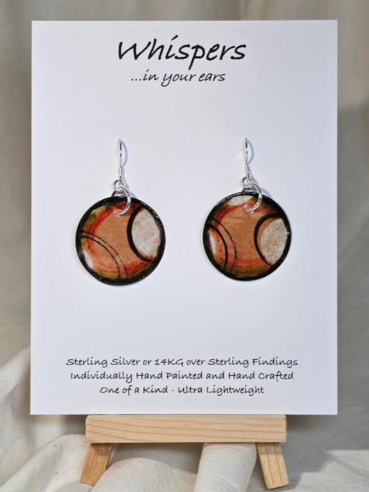 Hand painted Paper earrings. Embellished with acrylics. Look of white dot with black, orange and red lines. Ultra lightweight. 1 1/4 in diameter Sterling Silver findings. Hangs 1 1/2" in length