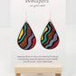 1980s Memphis Design Hand Painted Paper Earrings, 2" Tear drop shape heavy pattern and bold primary colors. Outlined in black. Back of earring similar pattern. Resin coated for durability. Sterling silver ear wires and findings. Ultra light weight. Hangs 2 1/4"