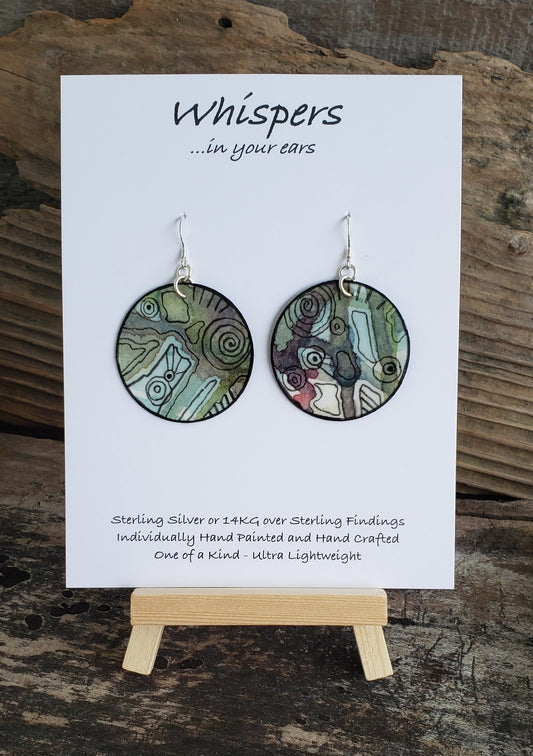 Hand painted water ultra lightweight paper earrings. Muted greens, blues and red accented by black linear shapes. Back is painted in black a complimentary color. Circular in shape. Hangs 1 3/4" in Length