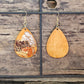 Wood Earrings Hand Painted Ultra Lightweight. Color washed  background in golden yellow tones. College with hand painted papers in rust, espresso, cream and 14kg leafing. Back is painted in complimentary colors. Teardrop in shape Hangs 2 1/4" in Length