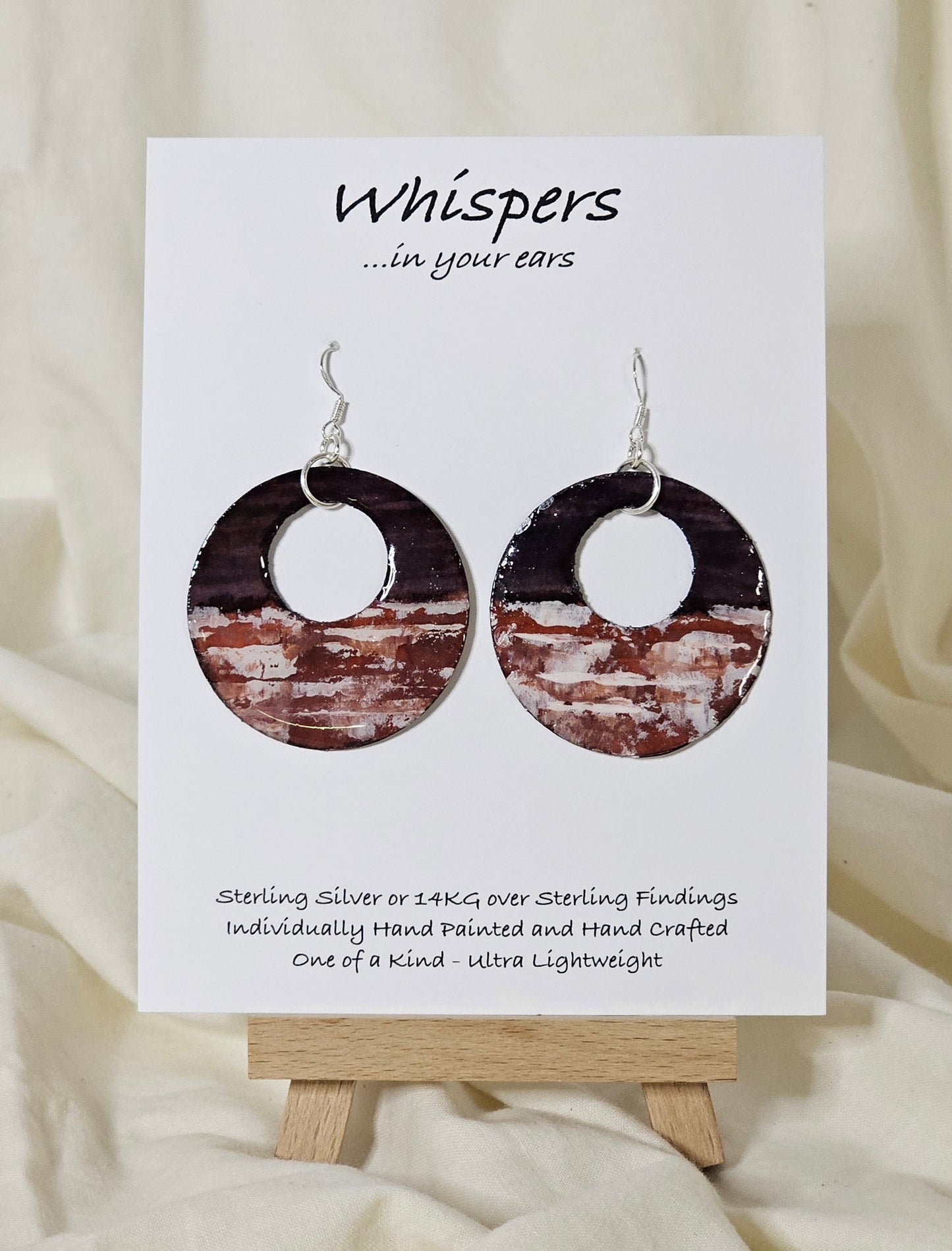 Hand painted watercolor ultra lightweight paper earrings.  Deep purple and faux brick inspired watercolor painting.  Back is painted with the same color and design. Circular in shape.  1 3/4 " in Diameter. Sterling silver findings. Hangs 2" in Length