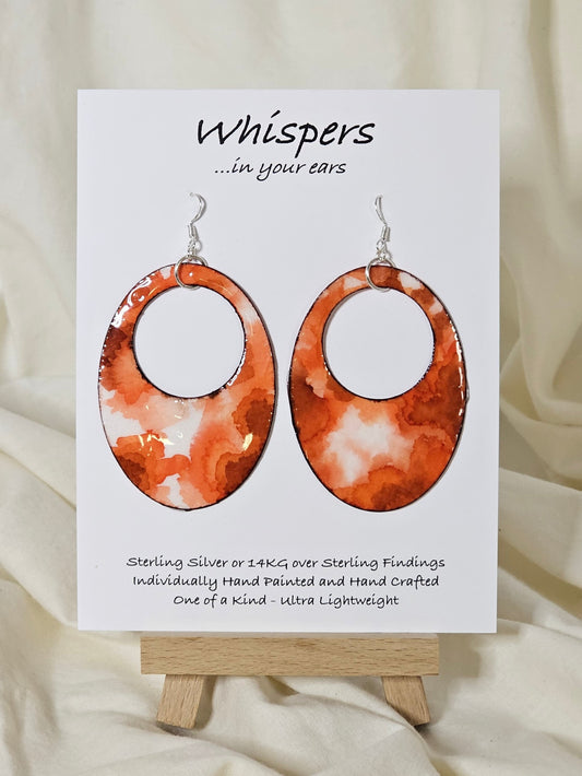 Hand painted watercolor ultra lightweight paper earrings.  Deep orange and tangerine colors, organic shape inspired watercolor painting. Edge detailed in thin espresso brown color. Back is painted with the same color and design. 2" Large oval hoop in shape. Sterling silver findings. Hangs 2 3/4" in Length