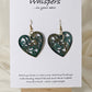 Heart Earrings Wood die cut hand painted. Faux Patinaed metal green, teal, bronze and gold. Filigree pattern. Enameled for durability. Back is painted in the same color and pattern.  Heart is 1 1/2 " in width. 14 kg over silver findings. Hangs 1 1/2" in length 