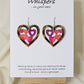 Heart Earrings Wood die cut hand painted Ultra lightweight. Pink Heart Rows Faux Tigerwood pattern. Enameled for durability. Back is painted in the same color and pattern.  Heart is 1 1/2 " in width. Sterling silver findings. Hangs 1 1/2" in length 