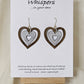 Heart Earrings Wood die cut hand painted Ultra lightweight. Silver and Walnut wood heart pattern. Enameled for durability. Back is painted in the same color and pattern.  Heart is 1 1/2 " in width. Sterling silver findings. Hangs 1 1/2" in length 
