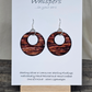 Rustic Faux Wood Circles Hand Painted Paper Earrings. Dark and medium brown in watercolor. Espresso painted edge detail. 1 1/2" Circular in shape with circular cut out.&nbsp; Sterling Silver findings. Hangs 1 3/4" in length