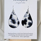 Black Cow Hide hand painted watercolor paper earrings. Ultra lightweight, 2 1/8" Tear Drop.&nbsp; Back is painted to match. Resin coating for durability. Sterling Silver findings. Hangs 2 1/2" in length.