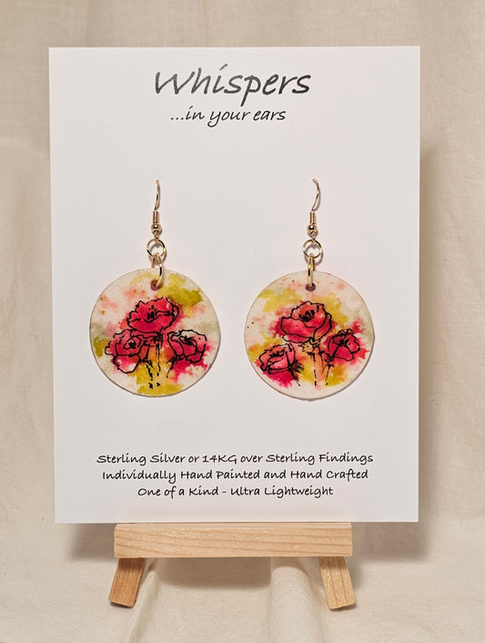 Pink Poppy Trio Hand Painted Paper Earrings. 1 1/2" Circle . Lime green and Hot pink Poppies. Back is painted in complimentary colors. Resin coating for durability. 14KG over sterling silver findings. Hangs 1 3/4" length