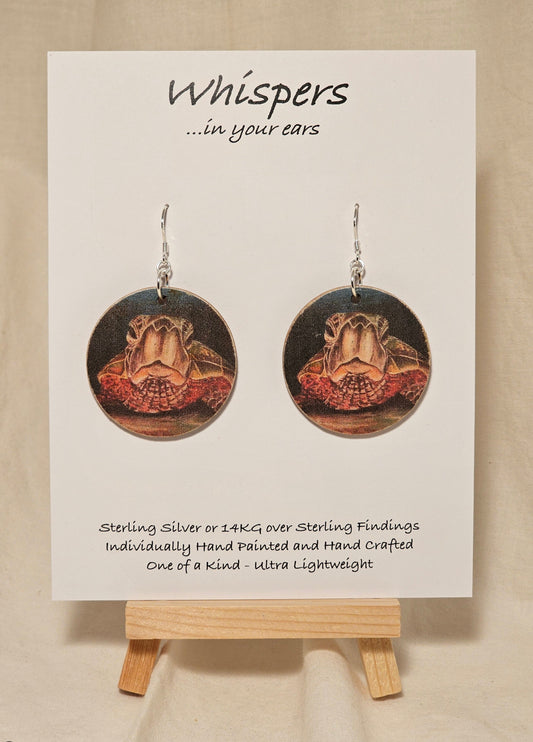 Sea Turtle Art Print Wood Earrings. Art image by Lee M. Hein. Sanded edges beachy look.&nbsp; Back is painted brown wash. 1 1/2" circle. Enameled for durability. Sterling Silver findings. Hangs 1 5/8" in length