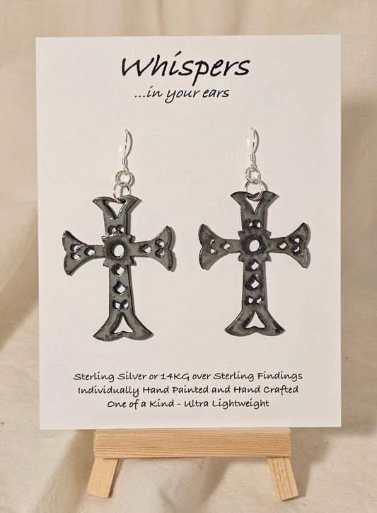 Gray Faux Enameled Wood Cross Hand Painted Earrings. Detailed to look aged. Celtic wooden cross. Back is painted to match. 2" in length. Enameled for durability. Sterling Silver findings. Hangs 2 1/4" in length