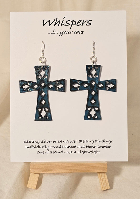 Turquoise Blue Faux Enamel Hand Painted Wood Cross Earrings. Painted to have an aged&nbsp; distressed look. 2" Wood Cross. Back is painted to match. Enameled for durability. Sterling Silver findings. Hangs 2 1/4" in length