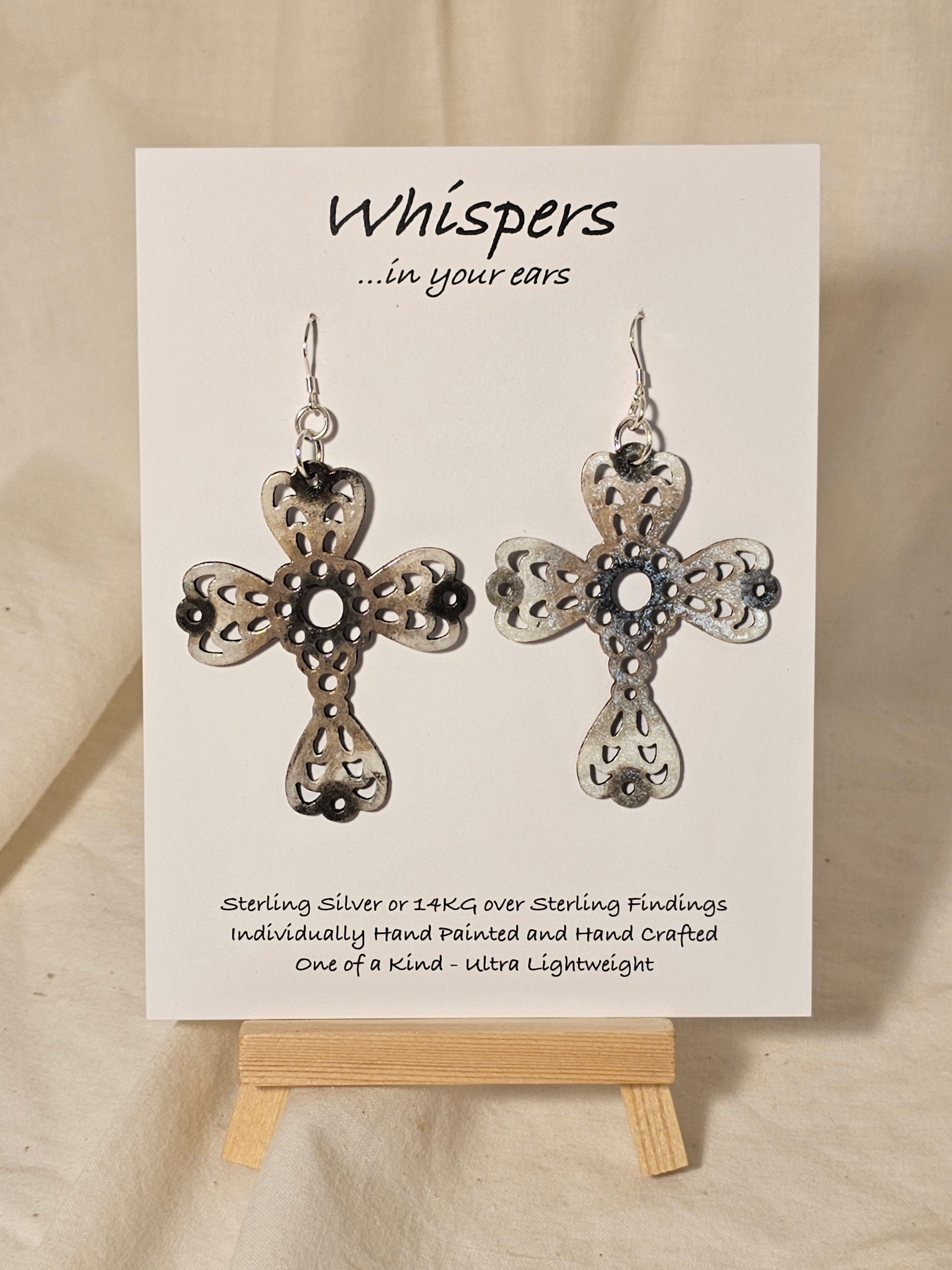 Weathered Wood Cross Hand Painted Wood Earrings. White, Beige and Brown2 1/4" Cross. Back is painted to match. Enameled for durability. Sterling Silver findings. Hangs 2 1/2" in length