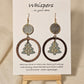 Christmas Tree Hand Painted Wood Earrings. Sage green, walnut and gold large statement piece. Wood disk, open wood circle with hanging wooden tree pendant. Back is painted to match. Enameled for durability. 14KG over sterling findings. Hangs 3" in length.