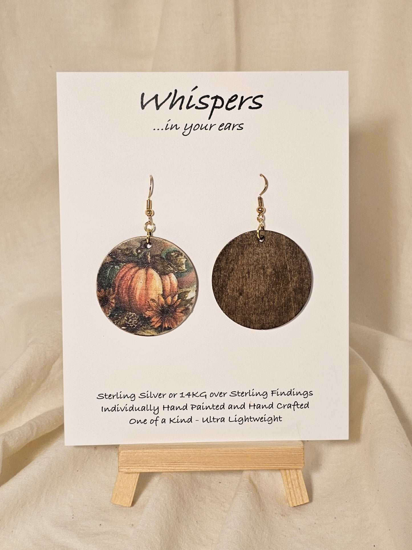 Pumpkin Harvest Art Print Wood Earrings. Artwork by Lee M. Hein. 1 1/2" Circle. Back is painted brown wash. Enameled for durability. 14KG over Sterling findings. Hangs 1 3/4" in length