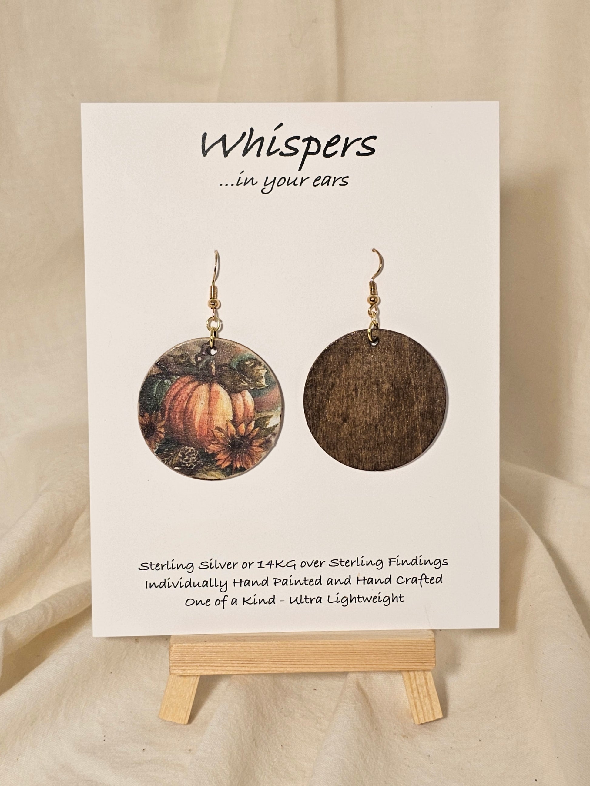 Pumpkin Harvest Art Print Wood Earrings. Artwork by Lee M. Hein. 1 1/2" Circle. Back is painted brown wash. Enameled for durability. 14KG over Sterling findings. Hangs 1 3/4" in length