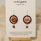 Red Ornament Ring Wood and Paper Earrings. 1 1/4" painted red wood ring with hanging hand painted watercolor ornament in the center. Multicolored glass bead hanging at the bottom. Back is painted in complimentary design. Enameled for durability. Sterling Silver findings. Hangs 2" in length