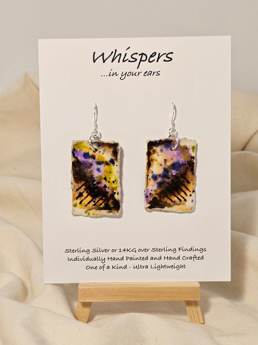 On the Fence Beach Scape Hand Painted Paper Earrings. Colorful abstract beach scape. Back is painted to match. Resin coating for durability. Sterling Silver findings. Hangs1 3/4" in length