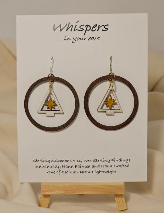 Frosted Gold Star Tree Ring Wood Earrings. Large 1 3/4" Dark wood tone ring with hand painted white tree with gold star pendant hanging in the center. Mixed metal findings. Sterling wires. enameled for durability. Hangs 2" in length