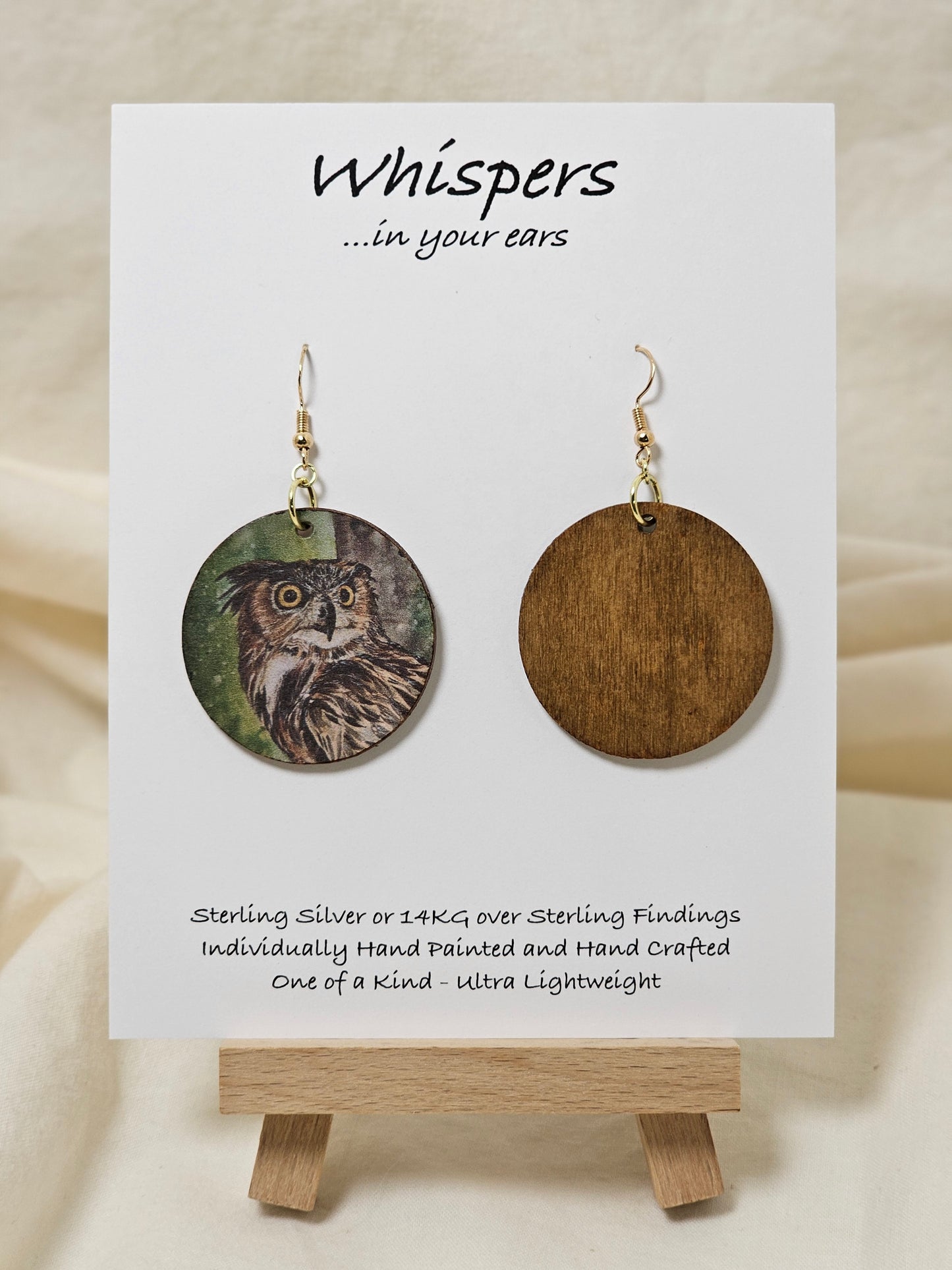 Owl Art Print Dark Wood Earrings. Artwork by Lee M. Hein. 1 1/2" Circle. Back is painted with dark brown wash. Enameled for durability. 14KG over Sterling findings. Hangs 1 3/4" in length