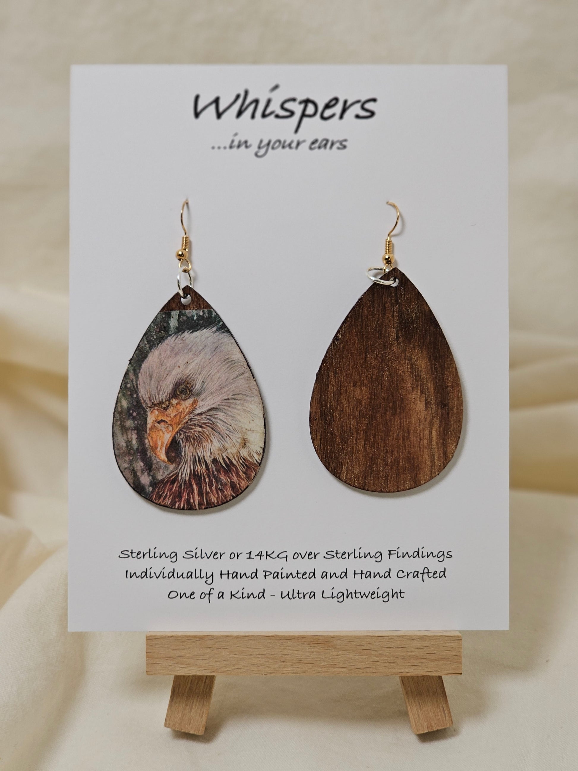 Eagle Art Print Dark Wood Earrings. Artwork by Lee M. Hein. 2" Tear drop. Back is painted with dark brown wash. Enameled for durability. 14KG over Sterling and Sterling silver findings. Hangs 2 1/4" in length