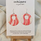 Sweet Swirls Hand painted watercolor paper earrings. Ultra lightweight. Dark pink, light pink, peach and white wavy stripes over a white background. Back is painted with similar color and design. Large circular in shape with circular cut out. Resin coating for durability. Sterling silver findings. Hangs 2" in Length