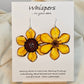 Sunflower Layered Flower Hand Painted Paper Earrings. Ultra lightweight 2 1/2" in diameter. Watercolor painted to resemble bright yellow sunflower. Center is separate layer painted dark brown. Back is painted in complimentary colors with small petal detail layer. Resin coating for durability. Sterling Silver findings. Hangs 2 5/8" in length