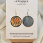 Daffodil Art Print Wood Earrings. Artwork by Lee M. Hein. Ultra lightweight 1 1/2" Circle. Back is painted with light blue wash. Edged in darker blue. Enameled for durability. Mixed metal 14KG over sterling and Sterling findings. Hangs 1 3/4" in length