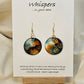 Gold Bullseye Hand Painted Watercolor Paper Earrings. Ultra lightweight 1 1/4" Circle abstract watercolor painting Deep blue, orange, brown and metallic gold bullseye accents. Back is painted to match. Edged in dark brown. Resin coating for durability. 14KG over sterling findings. Hangs 1 5/8" in length