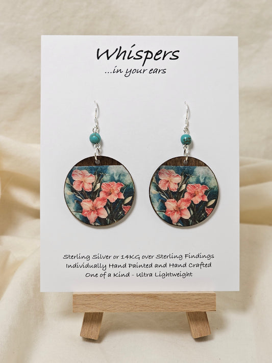 Tiger Lilies Art Print Wood Earrings. Artwork by Lee M. Hein. 1 1/2" Circle. Back is painted with dark brown wash. Enameled for durability. Turquoise bead embellishment. Sterling findings. Hangs 2" in length