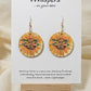 You are my sunflower Art Print Yellow Wood Earrings. Artwork by Lee M. Hein. 1 1/2" Circle. Back is painted with yellow wash. Enameled for durability. Mixed metal of Sterling Silver and 14KG over Sterling findings. Hangs 1 3/4" in length