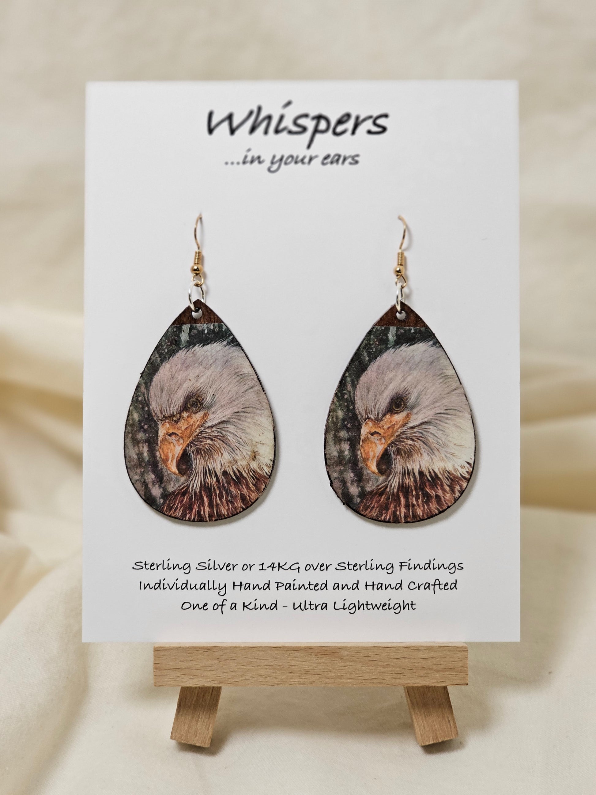 Eagle Art Print Dark Wood Earrings. Artwork by Lee M. Hein. 2" Tear drop. Back is painted with dark brown wash. Enameled for durability. 14KG over Sterling and Sterling silver findings. Hangs 2 1/4" in length