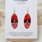 Red Sky Morning Hand Painted Paper Earrings. Ultra lightweight elongated 2" oval. Watercolor red, orange, white and gold sunrise over water. Back painted in similar color. Resin coating for durability. 14KG over sterling findings. Hangs 2 1/4" in length