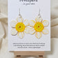 Yellow Burst Layered Flower Hand Painted Paper Earrings. Ultra lightweight 2 1/2" in diameter. Watercolor painted to resemble bright White and yellow flower with deep yellow veining. Center is separate layer painted. Back is painted in complimentary colors. Resin Coating for durability. Sterling Silver findings. Hangs 2 5/8" in length