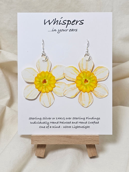 Yellow Burst Layered Flower Hand Painted Paper Earrings. Ultra lightweight 2 1/2" in diameter. Watercolor painted to resemble bright White and yellow flower with deep yellow veining. Center is separate layer painted. Back is painted in complimentary colors. Resin Coating for durability. Sterling Silver findings. Hangs 2 5/8" in length