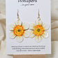 Natural Daffodil Flower Hand Painted Paper Earrings. Ultra lightweight 2 1/2" in diameter. Watercolor painted to resemble a yellow centered white daffodil. Back is painted in complimentary colors. Resin Coating for durability. Mixed metal findings. 14KG over sterling ear wires. Hangs 2 5/8" in length