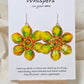 Pop Art Daffodil Flower Hand Painted Paper Earrings. Ultra lightweight 2 1/2" in diameter. Watercolor painted to resemble bright yellow and orange daffodil. Back is painted in complimentary colors. Resin Coating for durability. Sterling Silver findings. Hangs 2 5/8" in length
