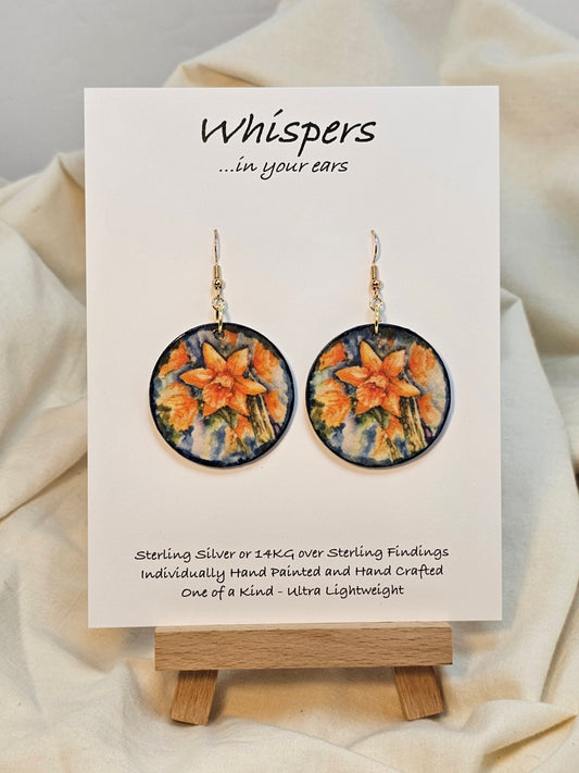 Daffodil Art Print Wood Earrings. Artwork by Lee M. Hein. Ultra lightweight 1 1/2" Circle. Back is painted with light blue wash. Edged in darker blue. Enameled for durability. Mixed metal 14KG over sterling and Sterling findings. Hangs 1 3/4" in length