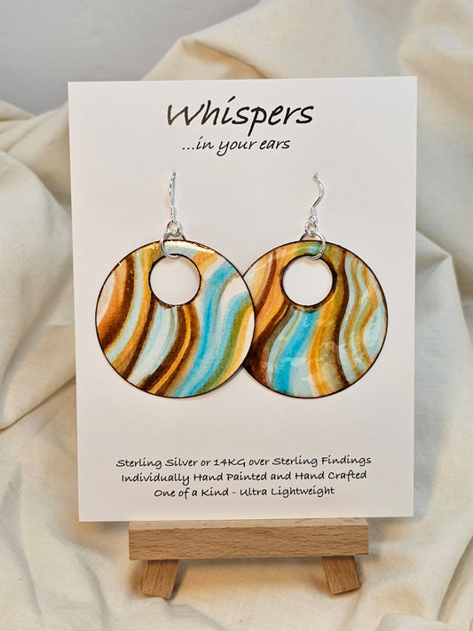 Waves of Peach Hand painted watercolor ultra lightweight paper earrings. 2" circle painted Aqua blue, peach and brown on white background. Dark brown detail painted edge. Back is painted with similar color and design. Large circular in shape with circular cut out. Resin coating for durability. Sterling silver findings. Hangs 2 1/4" in length