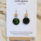Leaf Relief Hand Crafted Wood Earrings. 1" Wood Disc with two tone green handmade paper painted gold edges and hanging from cream colored square wooden bead. Resin Coating for durability. Back is done to compliment. 14kg over sterling ear wire sterling silver findings. Hangs 1 3/4"