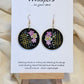 Cherry Blossom Grid Hand Painted/Crafted Wood Earrings. 1 1/2" Wood Disc with handmade paper with painted cherry blossoms painted gold edges. Resin Coating for durability. Back is done to compliment. 14kg over sterling ear wire sterling silver findings. Hangs 1 3/4"