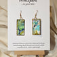 Land and Sea Abstract Hand Painted Paper Earrings. 3/4" x 1 1/2" Rectangle painted in watercolor on paper. Resin coated for durability. Mossy green, light green and blues. Edged in gold. Back is painted in similar design. 14kg over sterling silver ear wires and findings. Hangs 1 3/4"