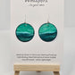Aqua Blue and teal hand painted paper earrings. Done in watercolor. Impressionistic ocean scape. Circular in shape. Back of earring is painted to match. Ultra lightweight. Resin coated for durability. 1 1/2 in diameter. Sterling findings. Hangs 1 3/4" in length