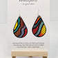 1980s Memphis Design Hand Painted Paper Earrings, 2" Tear drop shape heavy pattern and bold primary colors. Outlined in black. Back of earring similar pattern. Resin coated for durability. Sterling silver ear wires and findings. Ultra light weight. Hangs 2 1/4"