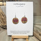 5 Poppies Hand Painted Wood Earrings. Stained 1"wood round, painted with pinkish red bunch of poppies. Ultra light weight. Back of earring is painted in same design. Enameled for durability. Acrylic ear wires, for metal sensitive ear lobes. Hangs 1 1/4"