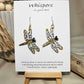 Dragonfly Wood Die Cut Hand Painted in metallic silver, bronze and gold acrylics. Resin coating for durability. Both sides are painted. Ultra light weight. Mixed metal findings of Sterling silver and 14kg over sterling. Hangs 2"